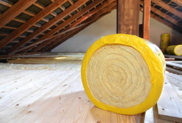 Fiberglass insulation roll ready for attic installation